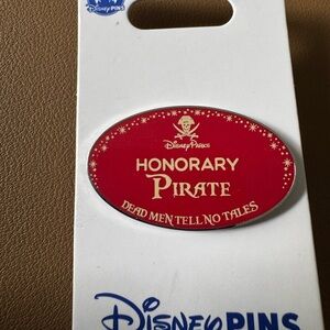 Disney Red Honorary Pirate Pin with Gold Text